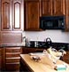 An overall view of a new home's kitchen cabinets