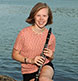 A high school senior at our Harpswell studio with her clarinet.