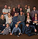 An extended family of 20 in studio.